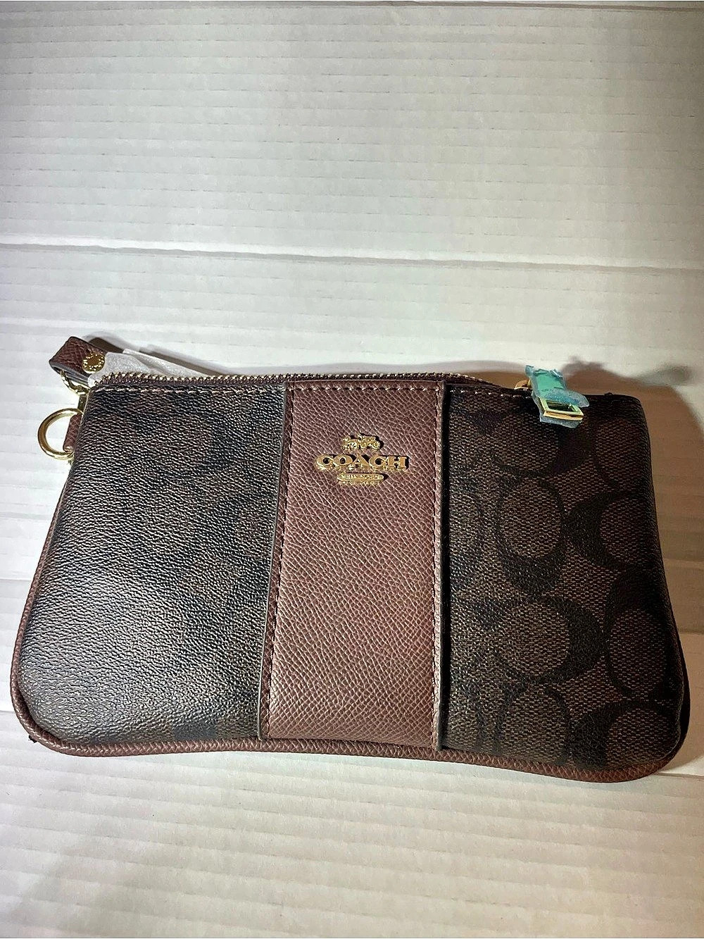 Coach Corner Zip Wristlet In Signature Canvas With Stripe Brown